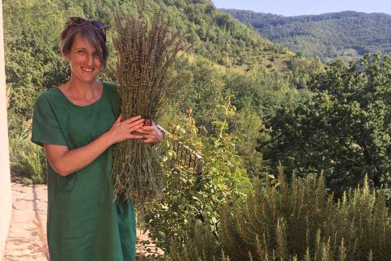 Jo holding a bunch of cut lavender